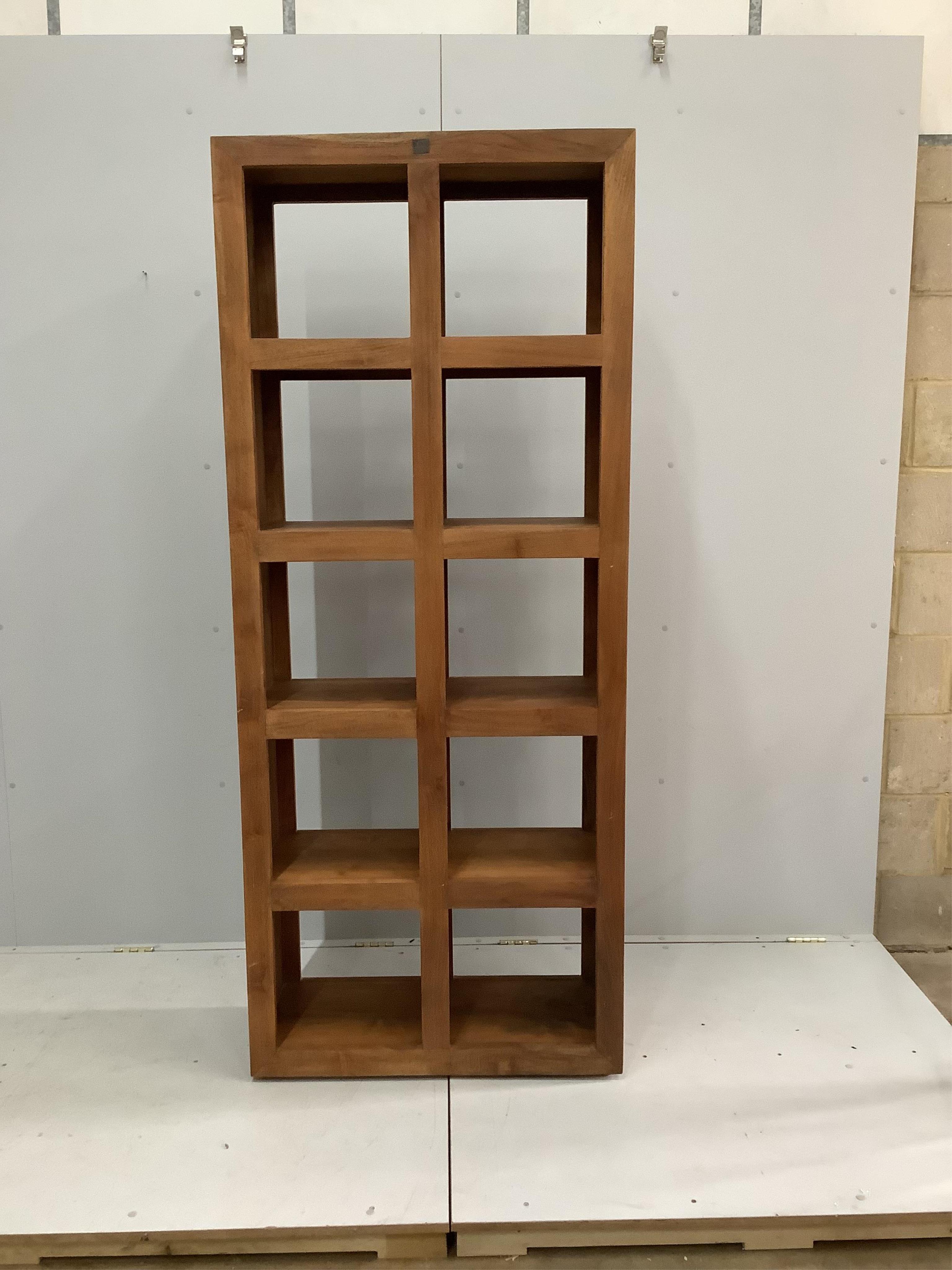 A Lombok teak open bookcase, width 82cm, depth 35cm, height 197cm. Condition - good